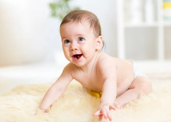 Crawling baby weared diaper