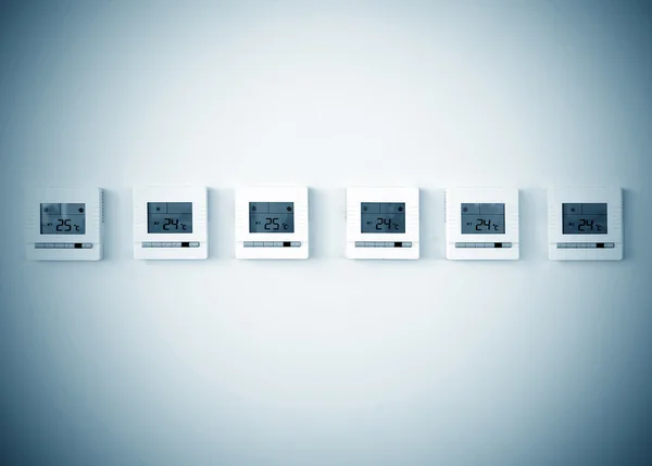 White wall digital thermostat