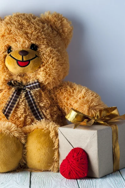 Teddy bear, red heart and gift box