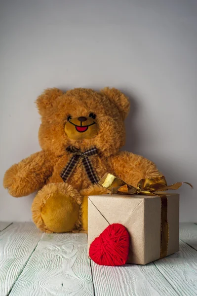 Teddy bear, red heart and gift box