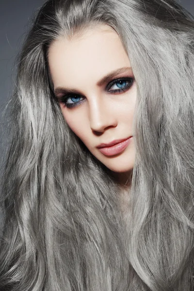 Beautiful woman with long grey hair