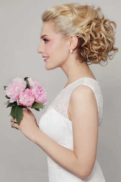Bride with stylish prom hairdo
