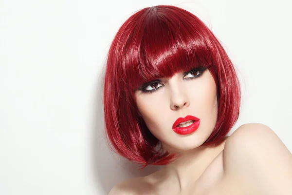 Red-haired girl with bob haircut