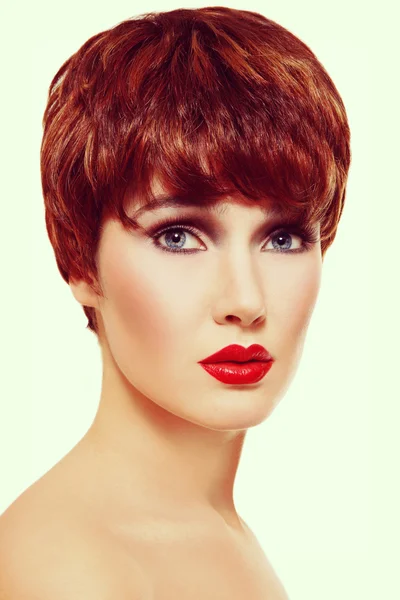 Beautiful redhead woman with short haircut