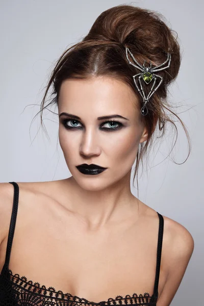 Woman with stylish gothic make-up