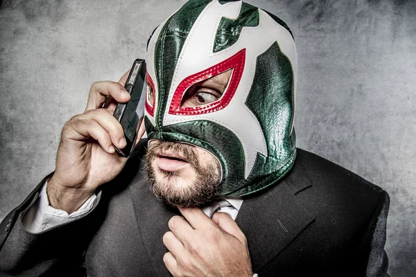 Businessman angry with Mexican wrestler mask