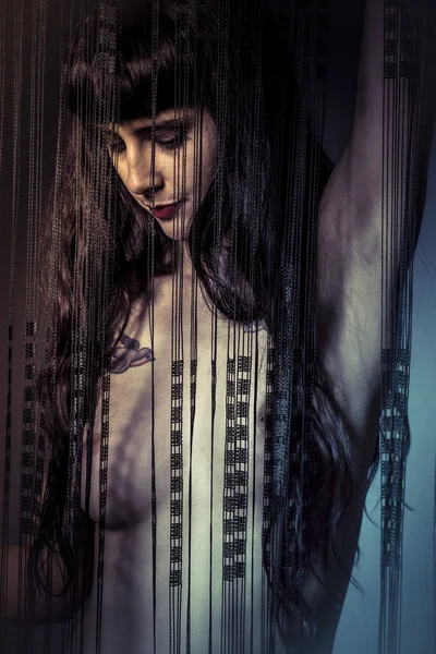 Naked girl behind curtains