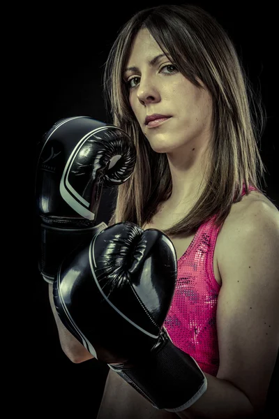 Female Athlete with boxing gloves