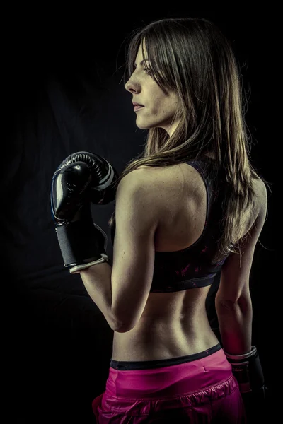 Female Athlete with boxing gloves