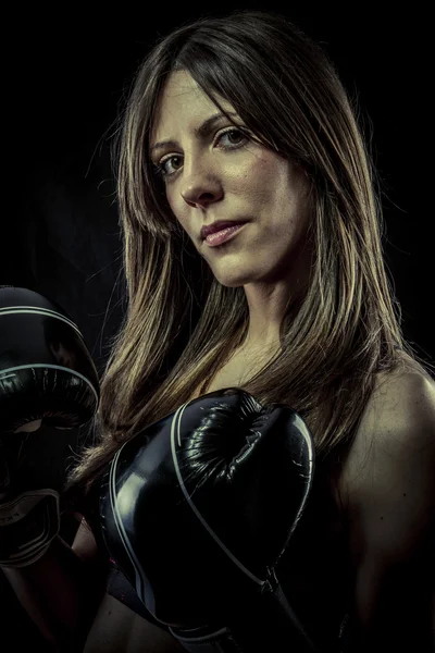 Sexy woman Athlete with boxing gloves