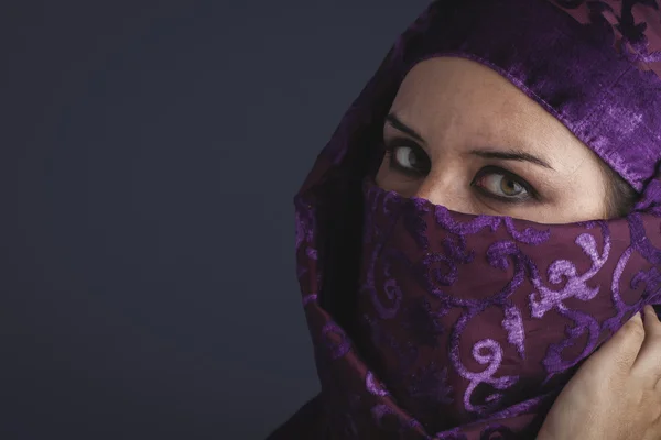 woman with traditional burqa veil