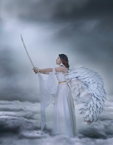 Angel holding a sword  in the sky