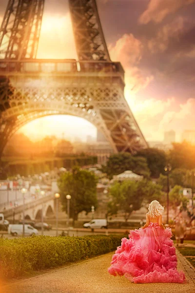 Girl in pink  dress in Paris