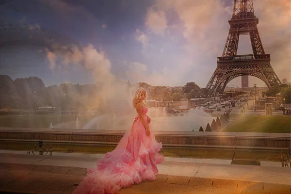 Girl in pink dress in Paris.