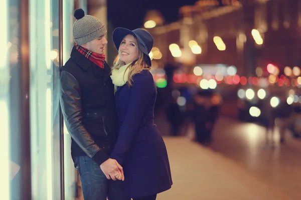 Attractive couple walking in city