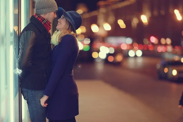 Attractive couple walking in city