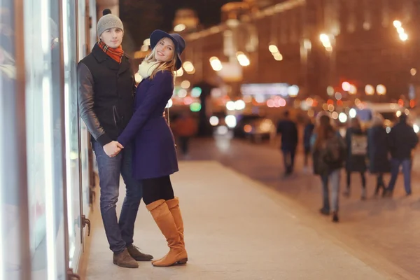 Attractive couple walking in city