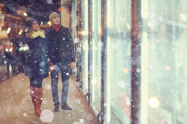 Attractive couple walking in city