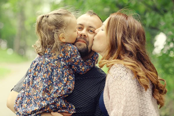 Mom and young daughter and dad