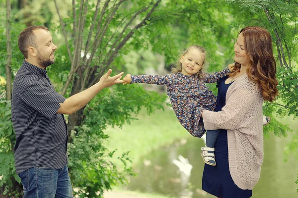 Mom and young daughter and dad