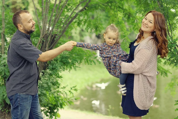 Mom and young daughter and dad