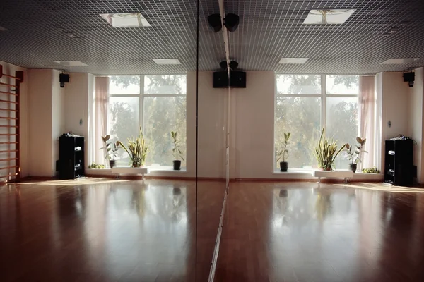 Interior of an empty gym with window