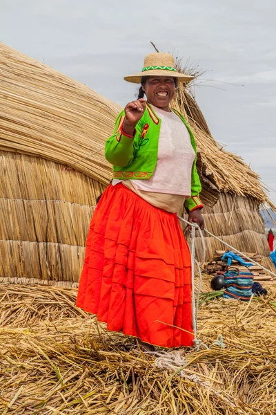 Inhabitant of one of Uros floating islands