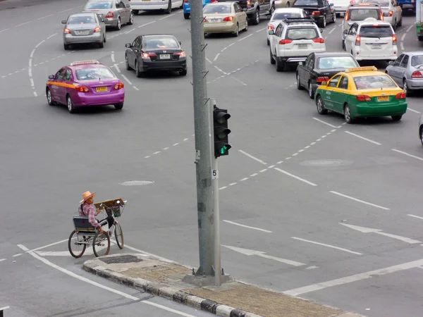 Bangkok ,Thailand - 16 April 2012 : Tricycle bicycle cruising the streets at Victory monument