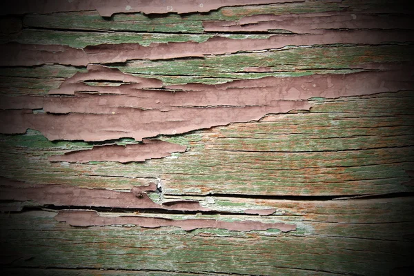 Grungy scratched painting on wood