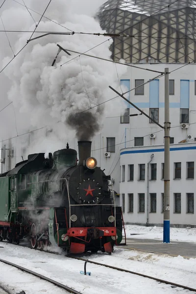 Retro steam train at the station