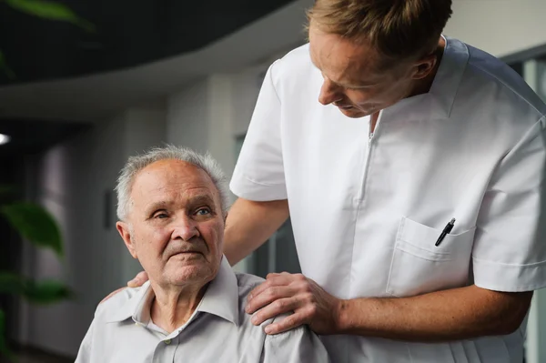 Healthcare worker and elderly patient