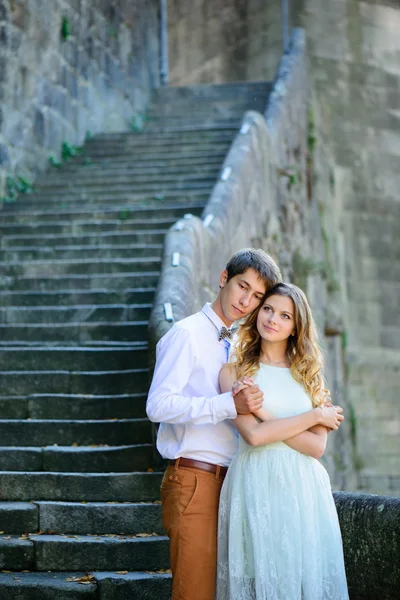 Couple in love strolling around an old castle