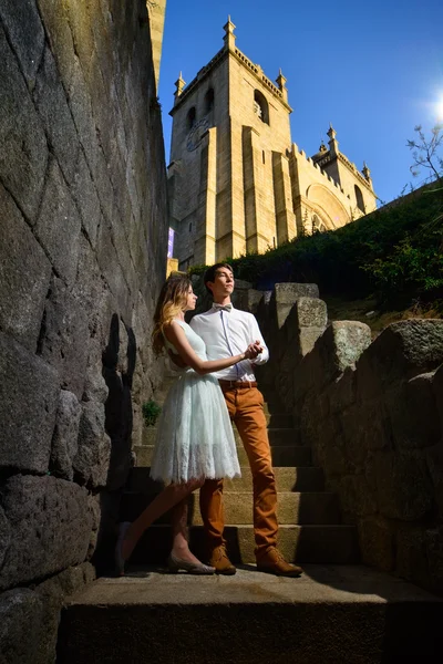 Couple in love strolling around an old castle