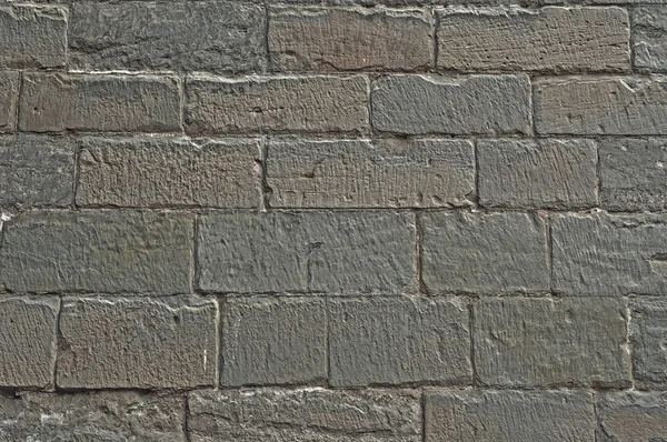 Limestone medieval wall of stone blocks texture background surface empty