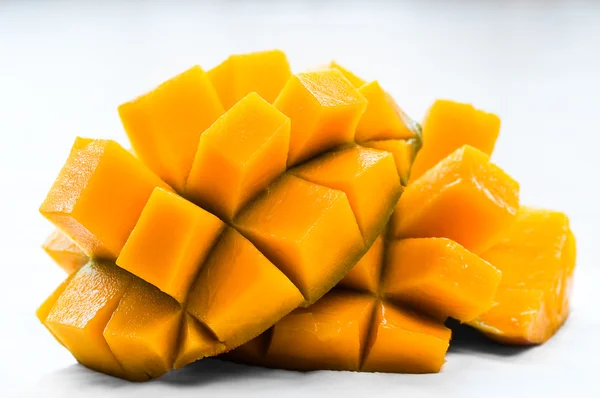 Mango sliced on the skin ready to eat organic healthy snack juicy fresh