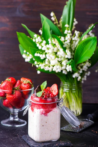 Healthy overnight oats with strawberry in jars