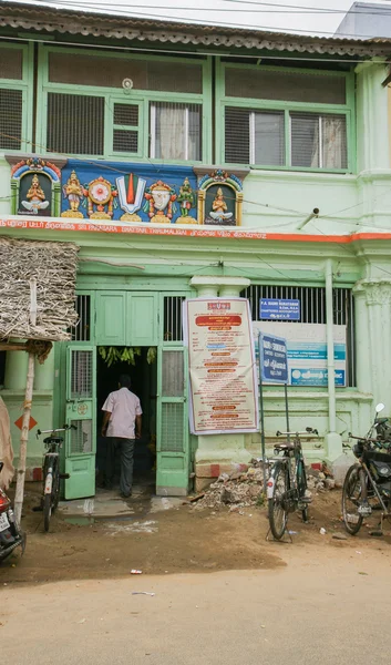 Pharmacy in Trichy with Vishnu symbols.