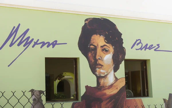 Graffiti of Myrna Baez face.