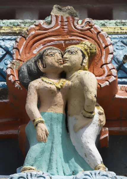Detail of older Gopuram at Mahalingeswarar Temple, standing kiss