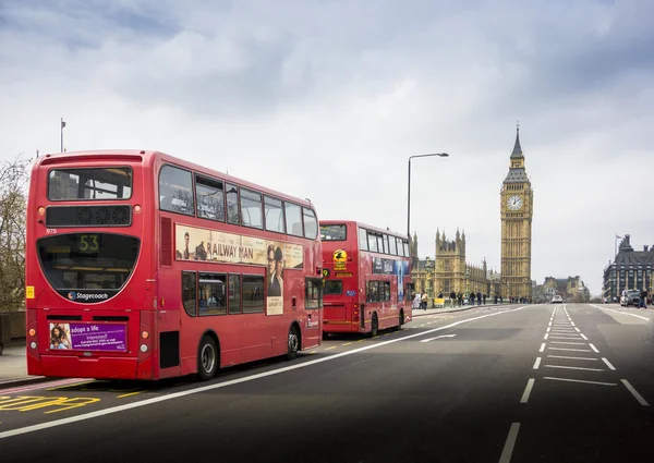 Two London Buses with Big Ben in London, England