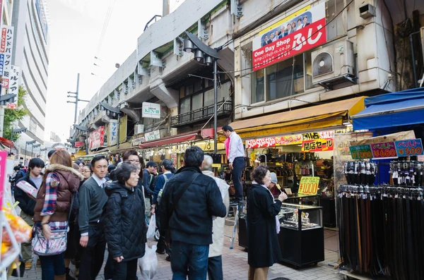 Tokyo, Japan- November 22, 2013: Shoppers visit Ameyoko market