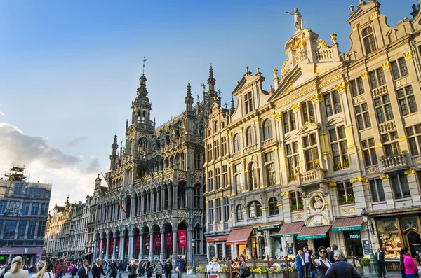 Brussels, Belgium - May 13, 2015: Many tourists visiting famous Grand Place of Brussels.