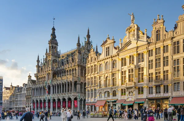 Brussels, Belgium - May 13, 2015: Many tourists visiting famous Grand Place the central square of Brussels