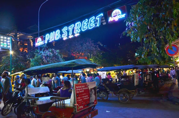 Siem Reap, Cambodia - December 2, 2015: Unidentified tourists shopping at the Pub street in Siem Reap