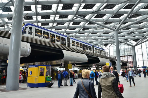 The Hague, Netherlands - May 8, 2015: Travelers at central Station of The Hague