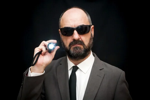 Handsome business man, bald and beard, with sunglasses and with