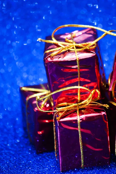 Gift packages on bright blue background