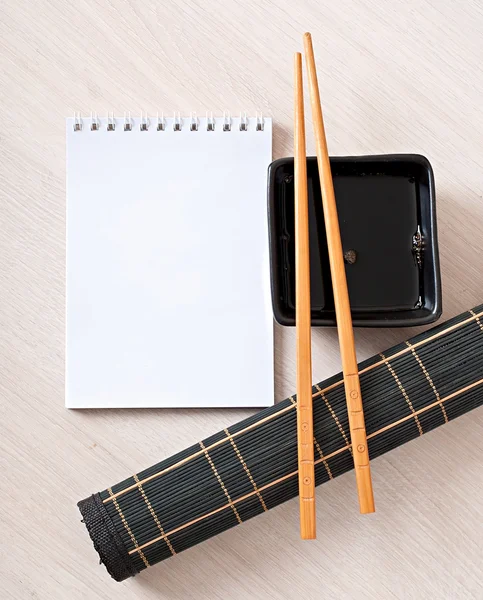 Sushi menu chopsticks for sushi on bamboo napkin