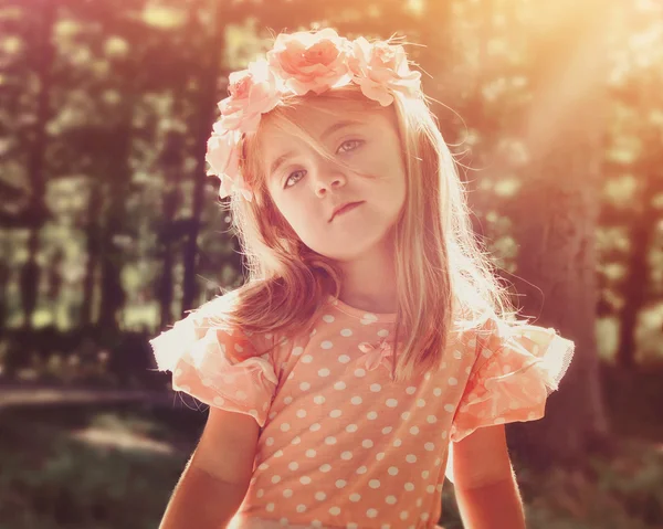 Beautiful Flower Girl in Woods with Sunshine