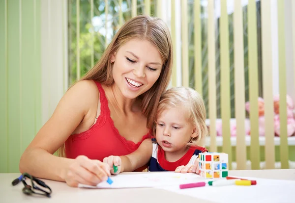 Mother and daughter at home